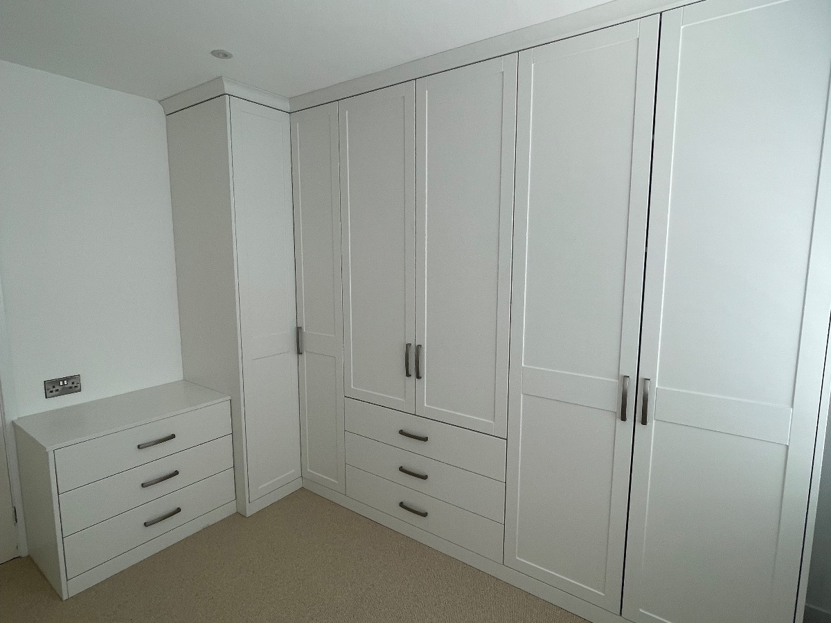Shaker styled fitted wardrobe. — Fitted wardrobe by R. Plane Carpenter, Norwich.