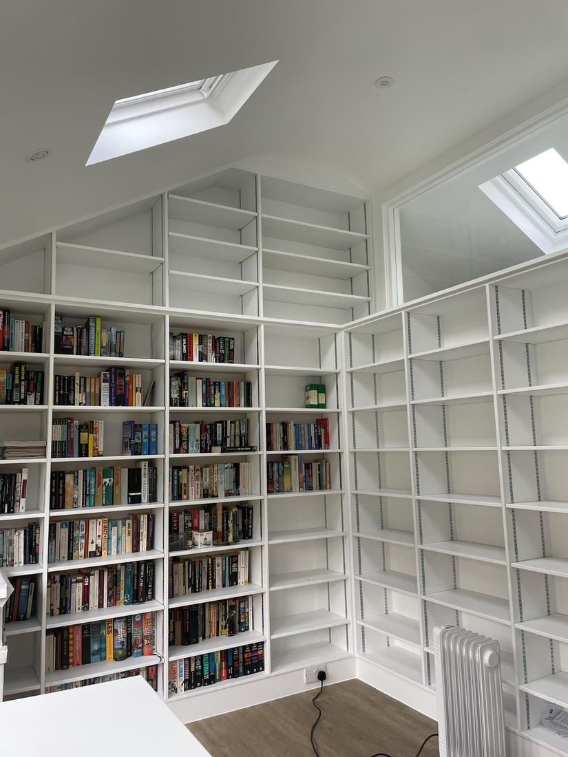 Floor-to-ceiling fitted shelving
