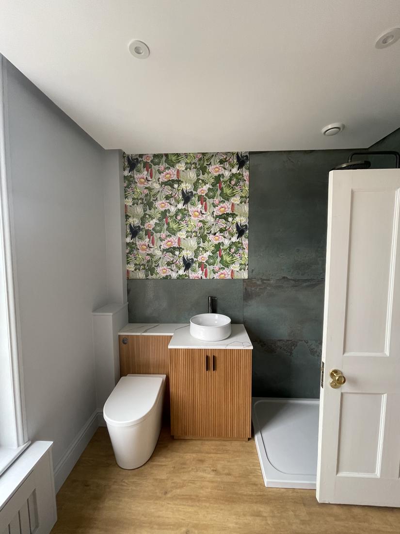 Reed-oak vanity and botanical feature wall